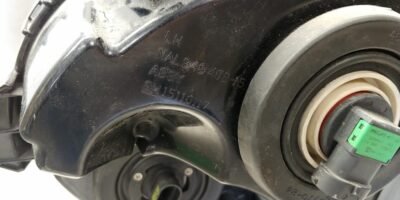 2003-2006 Chevrolet SSR OEM Left Driver Headlight Lamp 15110117